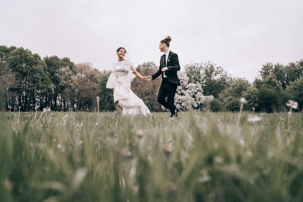 wedding photographs in a field
